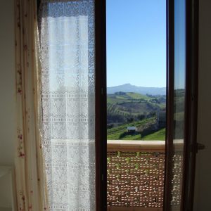 Open de window and enjoy the view of mother nature at Villa Bussola - Le Marche